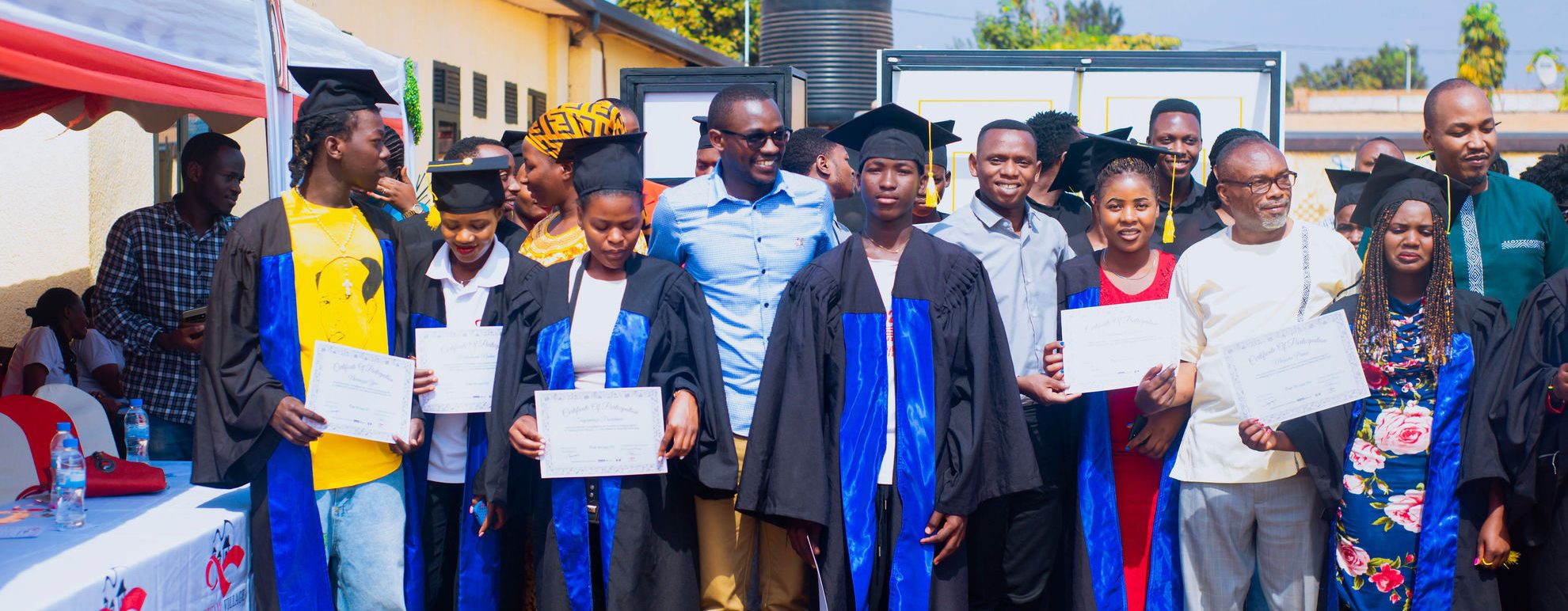 impact and evidence: rwanda nook hub graduation ceremony group photo
